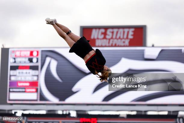 Cheerleader of the NC State Wolfpack performs prior to the game against the Louisville Cardinals at Carter-Finley Stadium on September 29, 2023 in...