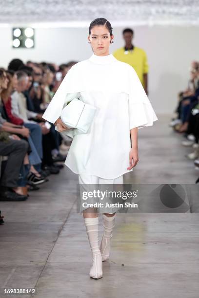 Model walks the runway at the Jil Sander fashion show during the Milan Fashion Week Womenswear Spring/Summer 2024 on September 23, 2023 in Milan,...