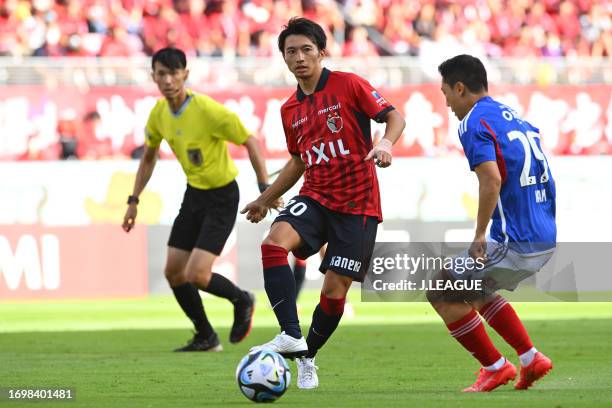 Gaku SHIBASAKI of Kashima Antlers in action#7 Tsukasa UMESAKI of Oita Trinita during the J.LEAGUE Meiji Yasuda J1 28th Sec. Match between Kashima...