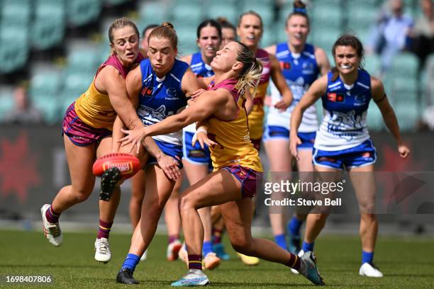 Mia King of the Kangaroos is tackledduring the round four AFLW match between North Melbourne Tasmania Kangaroos and Brisbane Lions at University of...