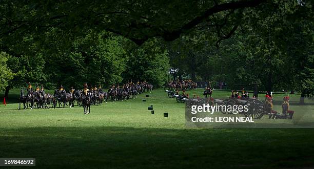 Members of the King's Troop Royal Horse Artillary prepare to fire a 41 gun salute in Green Park in central London on June 3, 2013 in honour of the...