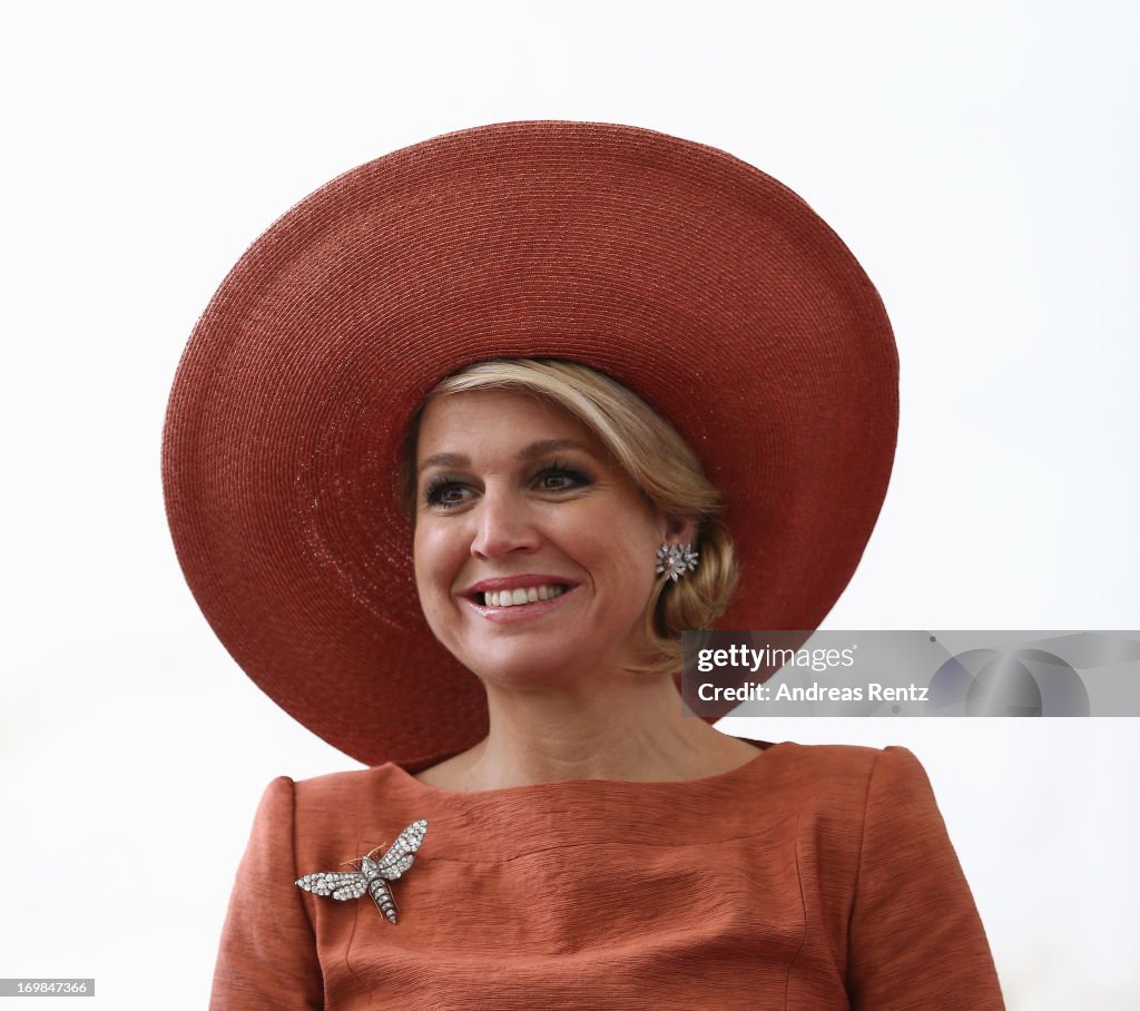 King Willem-Alexander And Queen Maxima Meet German Chancellor Angela Merkel