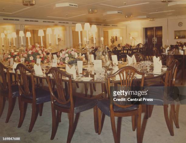The Dining Room set for dinner on the Royal Yacht Britannia, 1981.