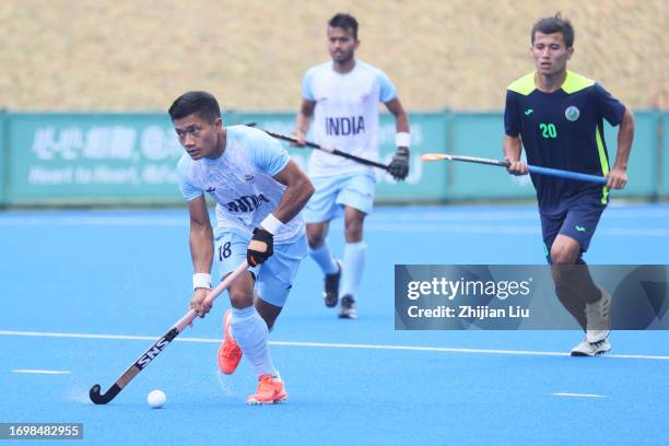 Sharma Nilakanta of India In action during the preliminary round of the Men’s Hockey Competition between India and Uzbekistan on day one of the Asian...