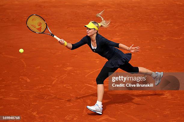 Maria Kirilenko of Russia plays a forehand during her Women's Singles match against Bethanie Mattek-Sands of the United States of America on day nine...