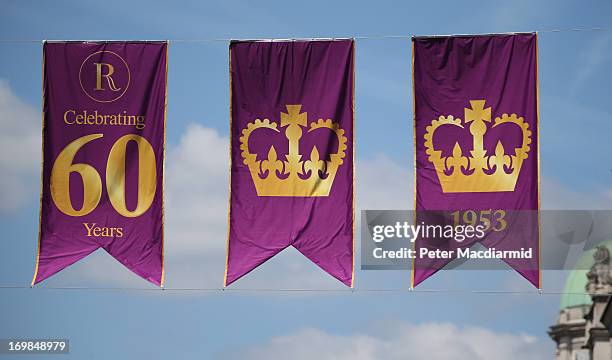 Flags fly over Regent Street to celebrate the 60th anniversary of the Coronation of Queen Elizabeth II on June 3, 2013 in London, England. The...