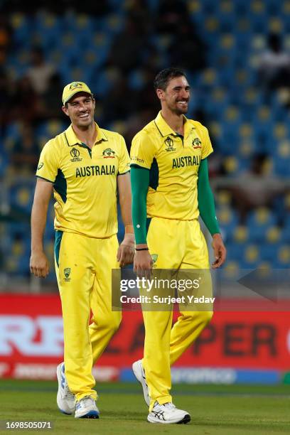 Mitchell Starc of the Australia and Pat Cummins of the Australia celebrates wicket of Bas de Leede of the Netherlands bowled during the ICC Men's...