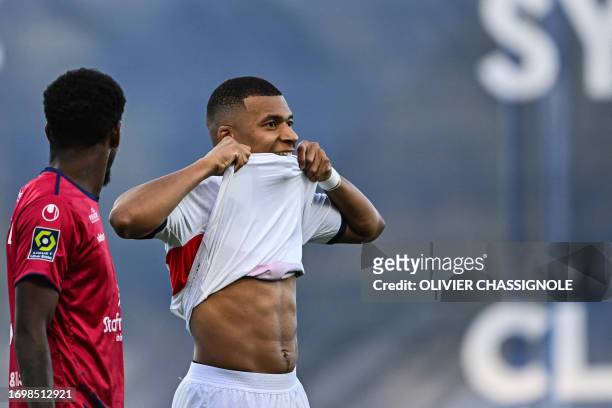 Paris Saint-Germain's French forward Kylian Mbappe reacts during the French L1 football match between Clermont Foot 63 and Paris Saint-Germain at...