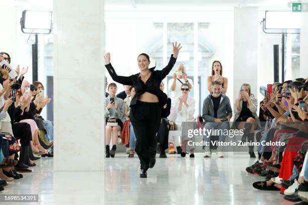 Fashion designer Karoline Vitto acknowledges the applause of the audience at the Karoline Vitto fashion show during the Milan Fashion Week Womenswear...