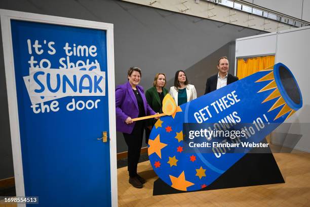 Liberal Democrat by-election winners, Sarah Dyke, Helen Morgan, Sarah Green and Richard Foord, have fun with the cannon prop during a visit to their...