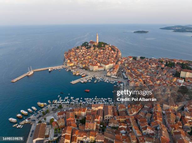 beautiful rovinj at sunrise, church of saint euphemia, aerial photo. the old town of rovinj, istria, croatia - istria foto e immagini stock