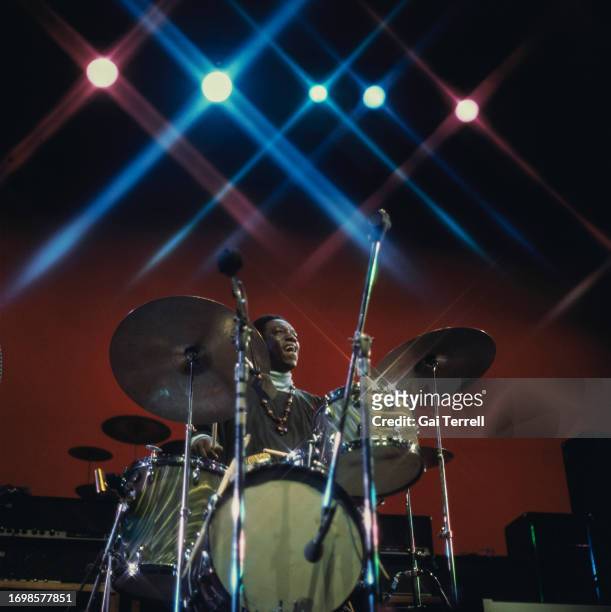 American drummer and bandleader Art Blakey, behind his drum kit as he performs in concert at the Newport Jazz Festival in Newport, Rhode Island,...