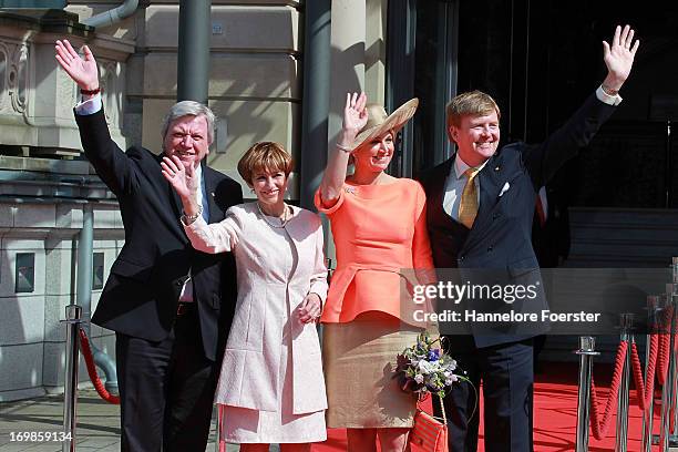 Minister-president of the German state of Hesse Volker Bouffier and his wife Ursula Bouffier stand with Queen Maxima and King Willem-Alexander of The...