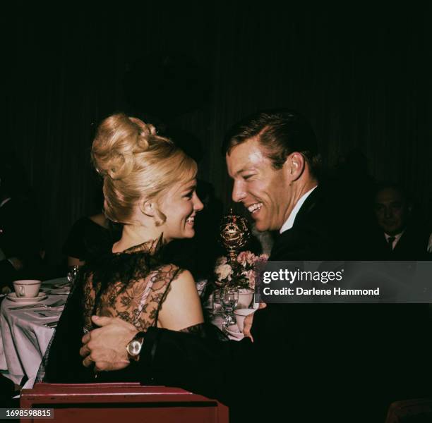 American actress Yvette Mimieux and American actor Richard Chamberlain attend the Hollywood premiere of 'The Unsinkable Molly Brown', in Los Angeles,...