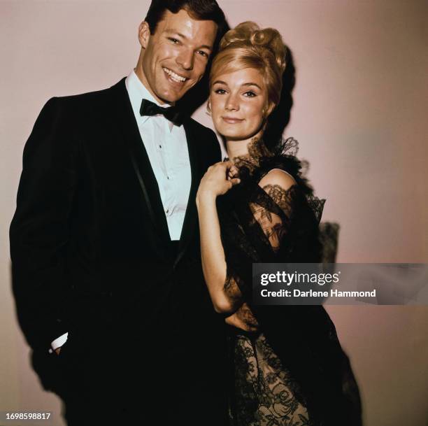 American actor Richard Chamberlain and American actress Yvette Mimieux attend the Hollywood premiere of 'The Unsinkable Molly Brown', in Los Angeles,...