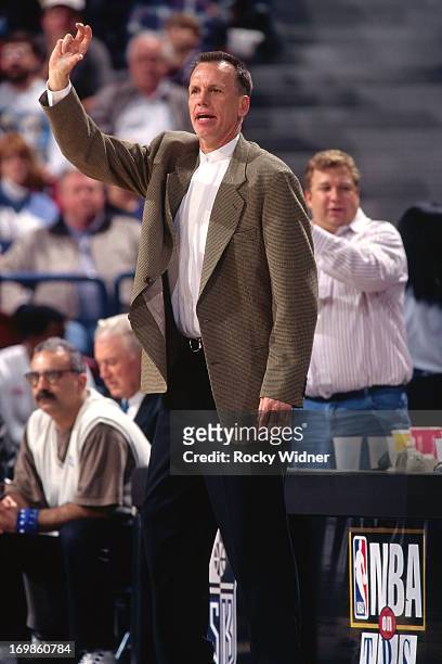 Detroit Pistons head coach Doug Collins calls a play against the Sacramento Kings during a game played on January 22, 1997 at Arco Arena in...