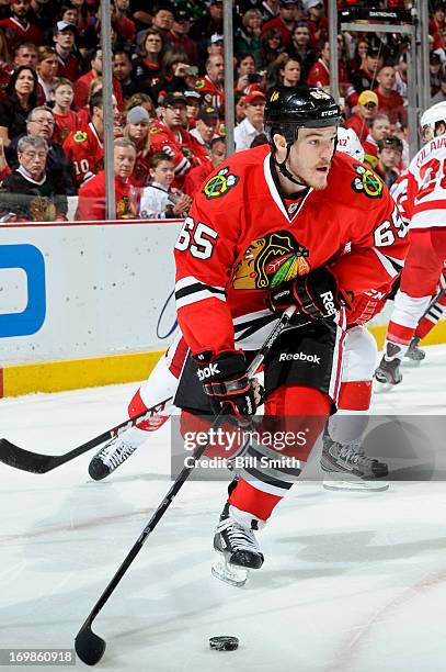 Andrew Shaw of the Chicago Blackhawks takes control of the puck in Game Seven of the Western Conference Semifinals against the Detroit Red Wings...