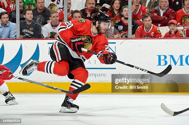 Brandon Saad of the Chicago Blackhawks shoots the puck in Game Seven of the Western Conference Semifinals against the Detroit Red Wings during the...