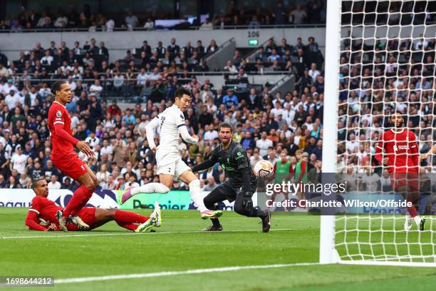 Son Heung-Min of Tottenham Hotspur scores the opening goal during the Premier League match between Tottenham Hotspur and Liverpool FC at Tottenham...