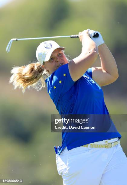 Caroline Hedwall of The European Team plays her third shot on the second hole in her match against Ally Ewing during the final day singles matches on...