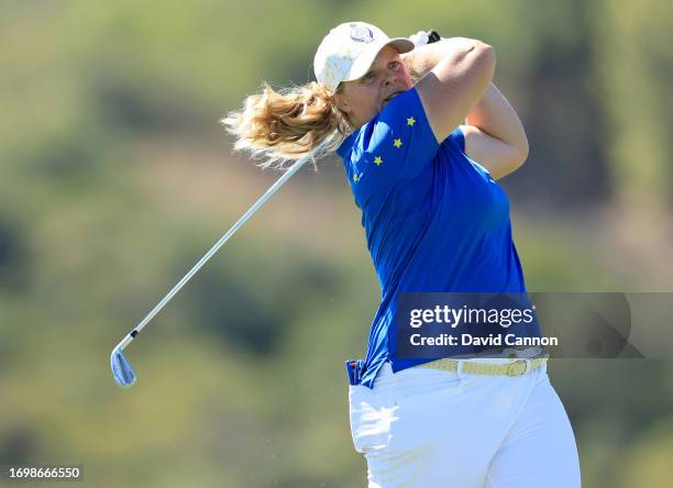 Caroline Hedwall of The European Team plays her third shot on the second hole in her match against Ally Ewing during the final day singles matches on...