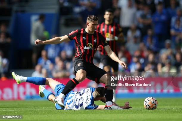 Evan Ferguson of Brighton & Hove Albion is challenged by Illya Zabarnyi of AFC Bournemouth during the Premier League match between Brighton & Hove...