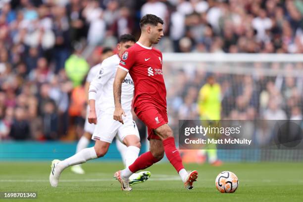 Dominik Szoboszlai of Liverpool passes the ball during the Premier League match between Liverpool FC and West Ham United at Anfield on September 24,...