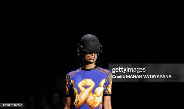 Model presents a creation by Indian designer Prashant Verma during the Wills India Fashion Week in New Delhi on March 19, 2009. The Wills India...