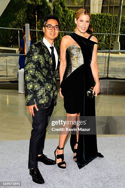 Designer Rafe Totengco and Mary Alice Stephenson attend 2013 CFDA Fashion Awards at Alice Tully Hall on June 3, 2013 in New York City.