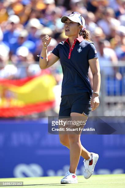 Danielle Kang of Team USA celebrates a par on the 15th green during Day Three of The Solheim Cup at Finca Cortesin Golf Club on September 24, 2023 in...