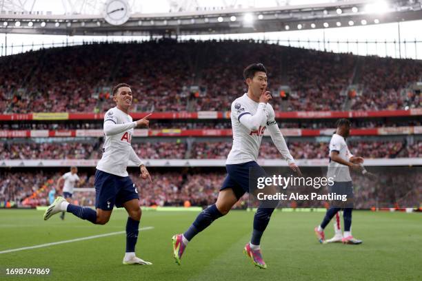 Heung-Min Son of Tottenham Hotspur celebrates after scoring the team's first goal during the Premier League match between Arsenal FC and Tottenham...