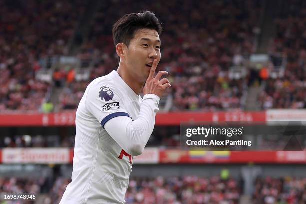 Heung-Min Son of Tottenham Hotspur celebrates after scoring the team's first goal during the Premier League match between Arsenal FC and Tottenham...