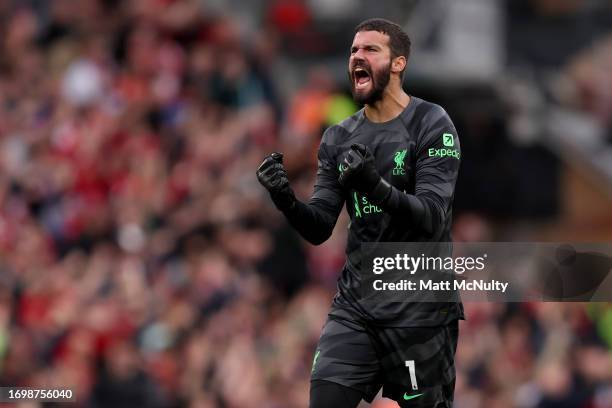 Alisson Becker celebrates a goal by Curtis Jones of Liverpool which was later disallowed by VAR during the Premier League match between Liverpool FC...