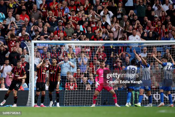 Milos Kerkez of AFC Bournemouth looks dejected after scoring an own goal, the first goal for Brighton & Hove Albion, during the Premier League match...