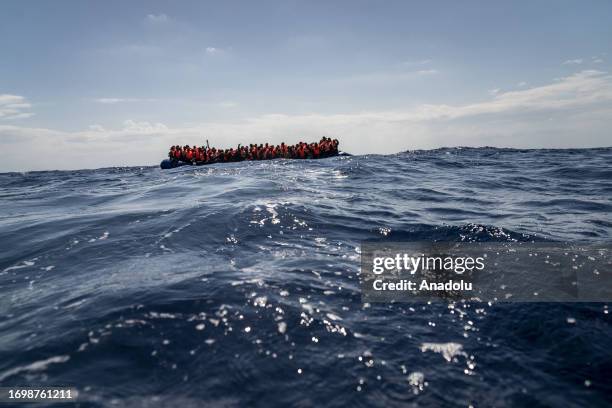 Migrants of different 14 nationalities are rescued by the Spanish NGO Open Arms in international waters, at sea on September 30, 2023. 178 migrants...