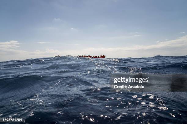 Migrants of different 14 nationalities are rescued by the Spanish NGO Open Arms in international waters, at sea on September 30, 2023. 178 migrants...