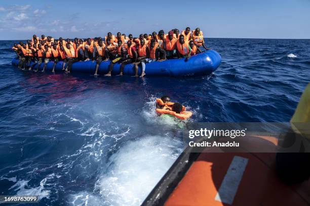 Migrants of different 14 nationalities are rescued by the Spanish NGO Open Arms in international waters, at sea on September 30, 2023. 178 migrants...