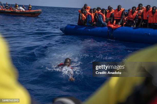 Migrants of different 14 nationalities are rescued by the Spanish NGO Open Arms in international waters, at sea on September 30, 2023. 178 migrants...