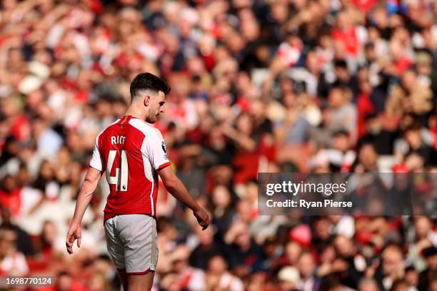 Declan Rice of Arsenal looks on during the Premier League match between Arsenal FC and Tottenham Hotspur at Emirates Stadium on September 24, 2023 in...