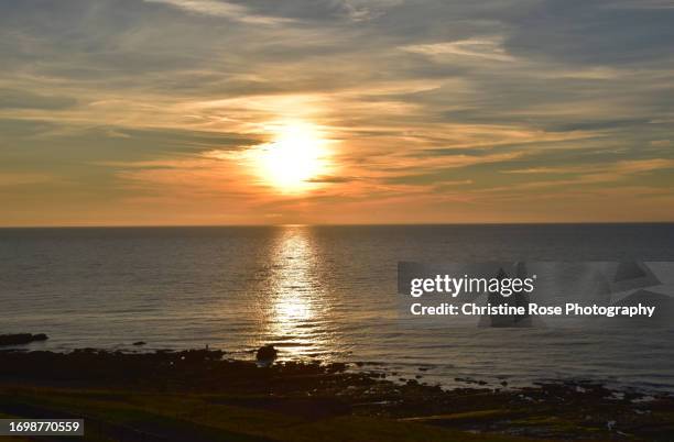 fishing in the sunset - irish sea stock pictures, royalty-free photos & images