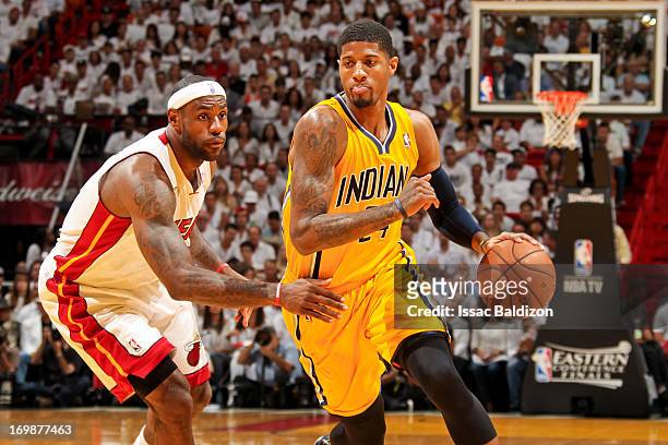 Paul George of the Indiana Pacers drives against LeBron James of the Miami Heat in Game Seven of the Eastern Conference Finals during the 2013 NBA...