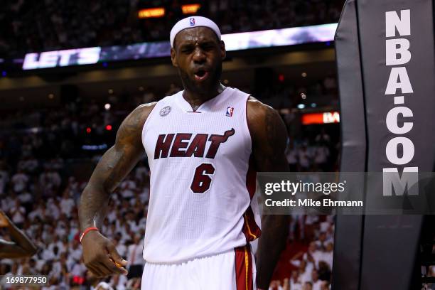 LeBron James of the Miami Heat reacts in the first half against the Indiana Pacers during Game Seven of the Eastern Conference Finals of the 2013 NBA...