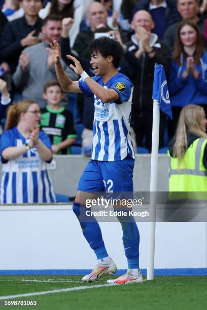 Kaoru Mitoma of Brighton & Hove Albion celebrates after scoring the team's third goal during the Premier League match between Brighton & Hove Albion...