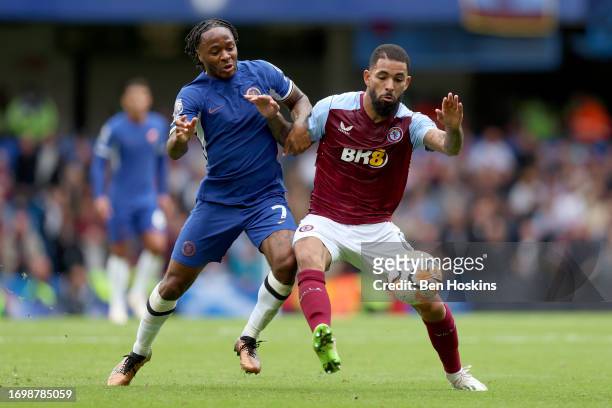 Raheem Sterling of Chelsea battles for possession with Douglas Luiz of Aston Villa during the Premier League match between Chelsea FC and Aston Villa...