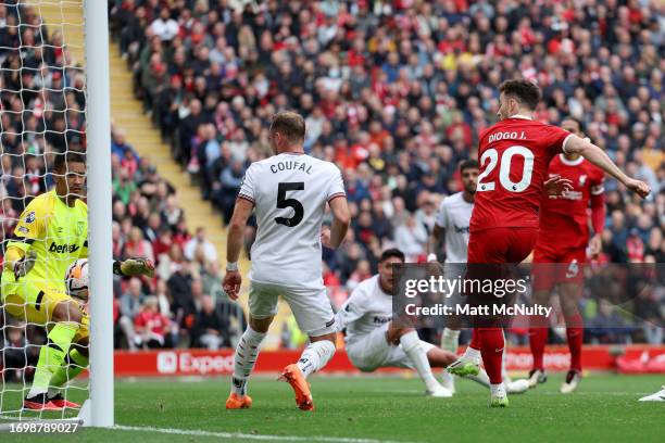 Diogo Jota of Liverpool scores the team's third goal during the Premier League match between Liverpool FC and West Ham United at Anfield on September...