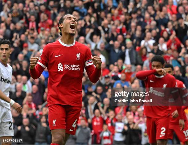 Virgil van Dijk of Liverpool celebrates after scoring the third goal during the Premier League match between Liverpool FC and West Ham United at...