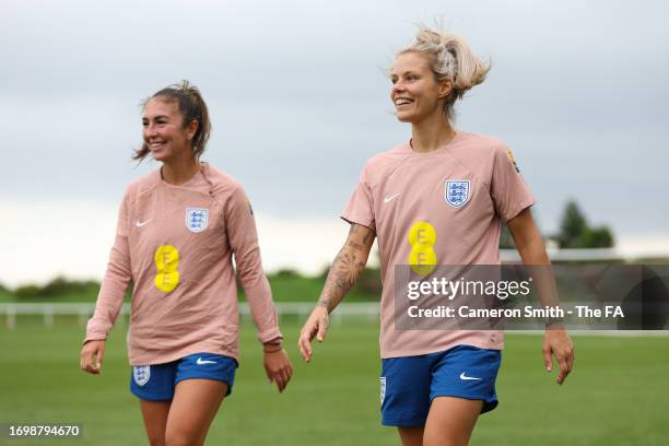 Katie Zelem and Rachel Daly of England react during a training session at The Academy of Light on September 24, 2023 in Sunderland, England.