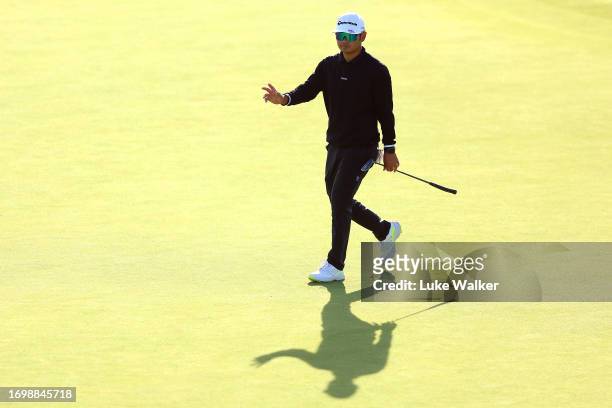Ryo Hisatsune of Japan reacts as he walks onto the 18th green during Day Four of the Cazoo Open de France at Le Golf National on September 24, 2023...