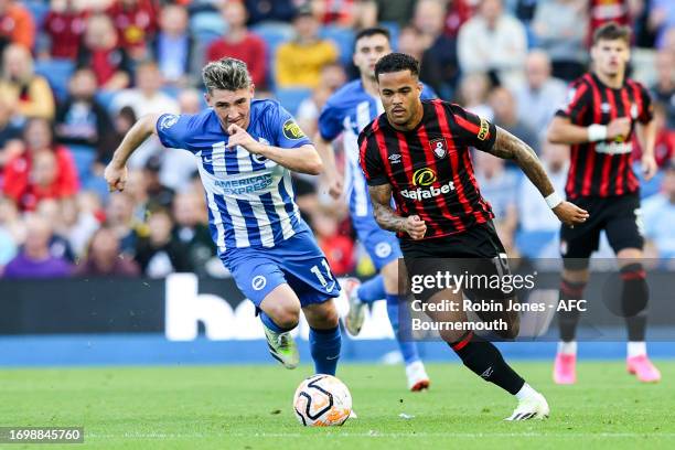 Billy Gilmour of Brighton & Hove Albion gives chase to Justin Kluivert of Bournemouth during the Premier League match between Brighton & Hove Albion...