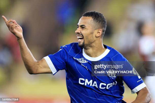 Marseille' Senegalese midfielder Iliman Ndiaye celebrates scoring his team's first goal during the French L1 football match between AS Monaco and...